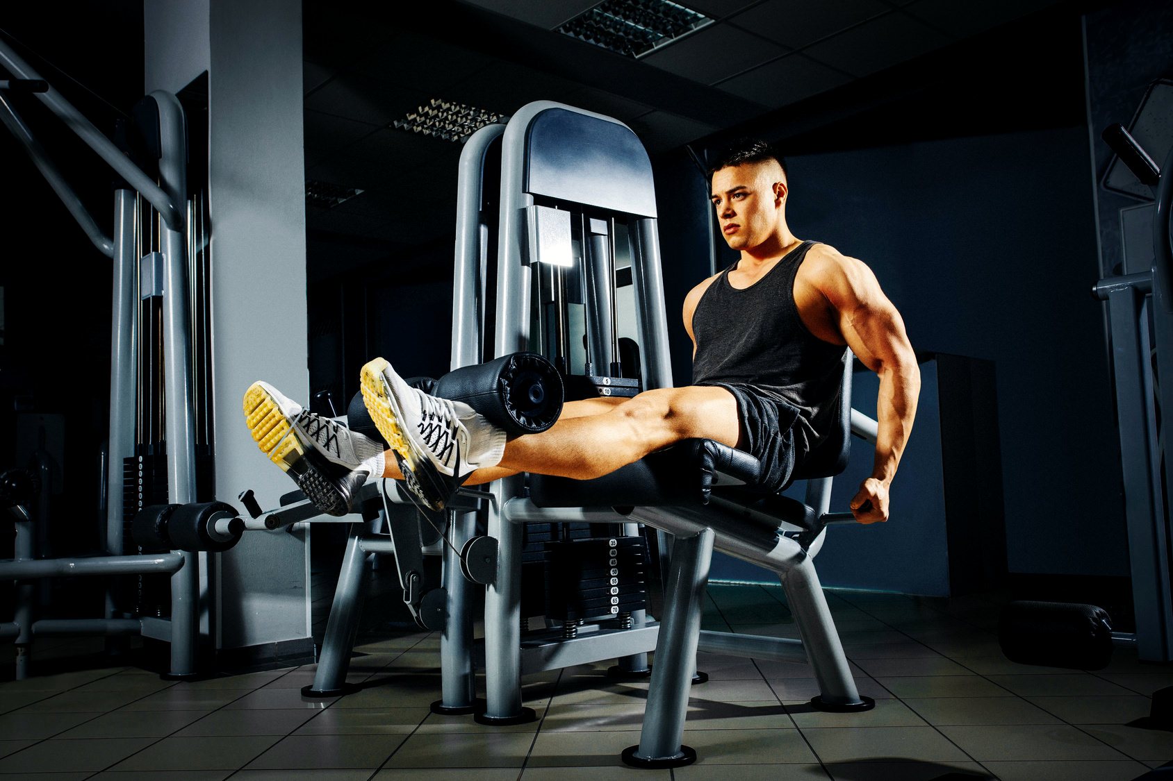 Comment utiliser la machine d'extension des jambes assises